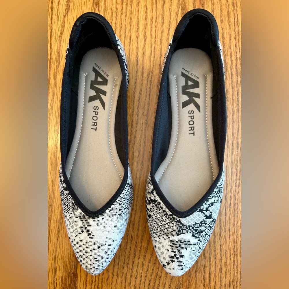 AK Sport: Odette pointed toe flat. Black, white and gray fabric. Rubber sole. 8M